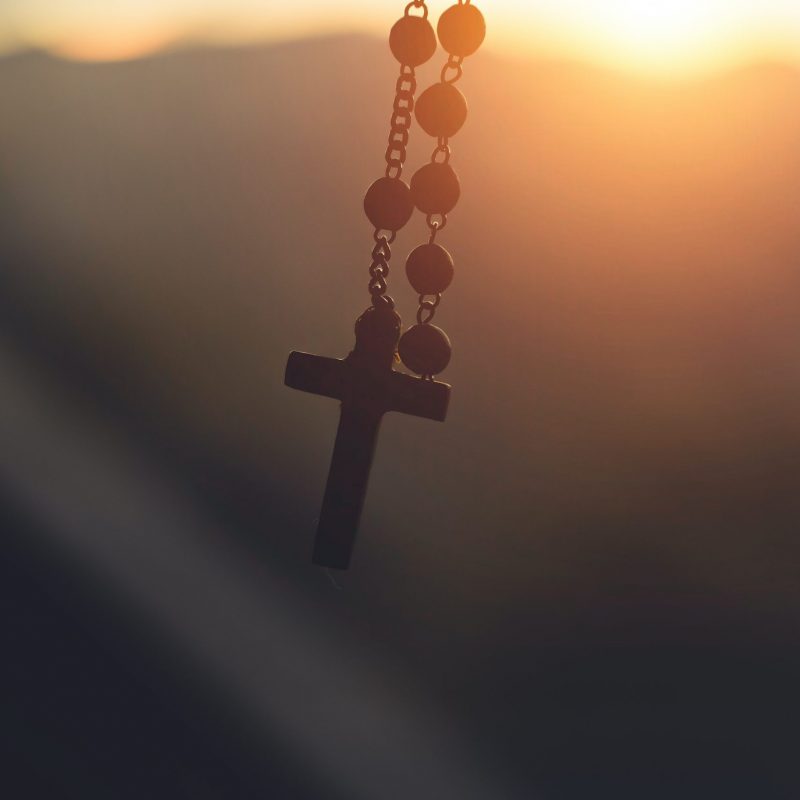 silhouette-photography-of-hanging-rosary-2081128